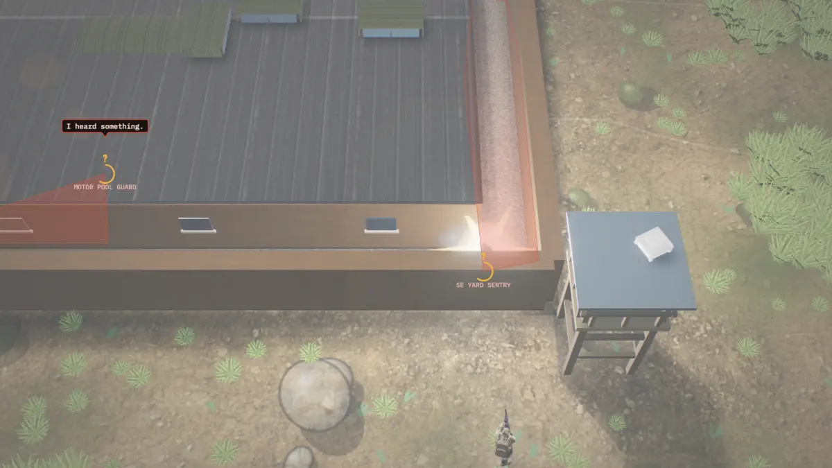 A flashbang going off in a white burst next to a sentry outside the motor pool.