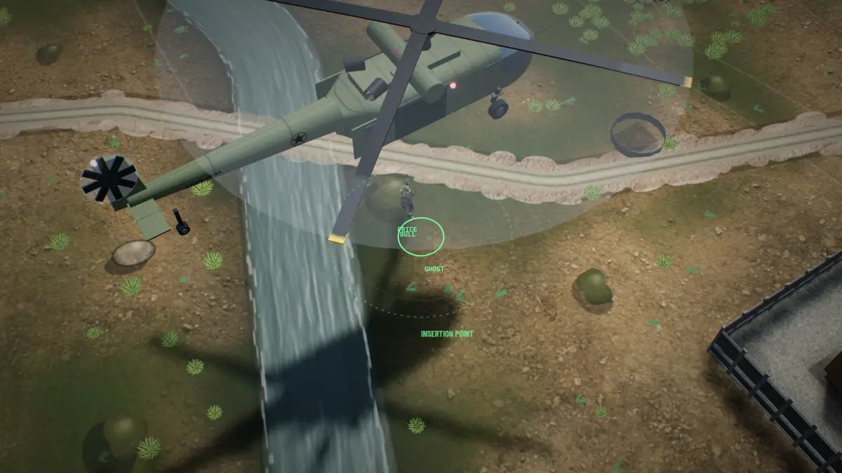 A helicopter hovering over a river with operators sliding down ropes to the insertion point.